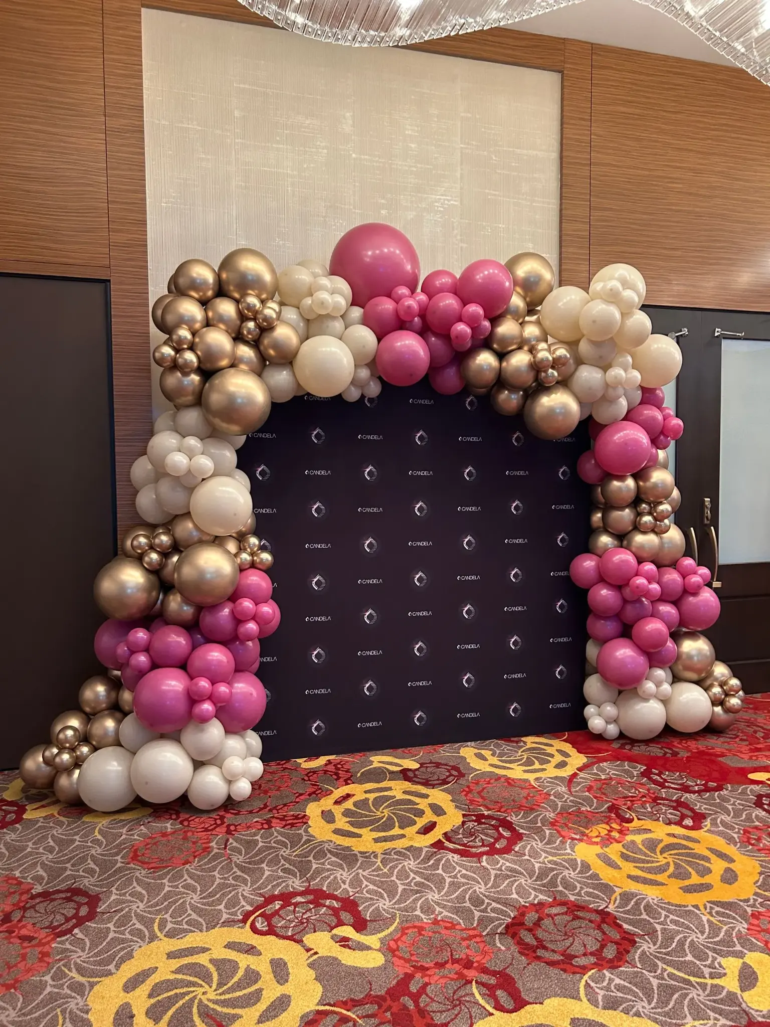 Branded step-and-repeat backdrop for corporate photography